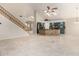 Bright living space features vaulted ceilings, skylights, wood staircase, and an island with stone accents at 4801 E Quien Sabe Way, Cave Creek, AZ 85331