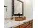 Stylish powder room featuring a unique vessel sink, ornate mirror, and granite countertop at 4801 E Quien Sabe Way, Cave Creek, AZ 85331