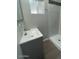 Updated bathroom with modern vanity, shower, and neutral tile at 500 N 67 Ave # 149, Phoenix, AZ 85043