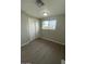 Bright bedroom with natural light, vinyl flooring and closet at 500 N 67 Ave # 149, Phoenix, AZ 85043
