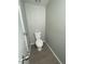 Small powder room with toilet, light gray walls and vinyl flooring at 500 N 67 Ave # 149, Phoenix, AZ 85043