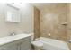 Bright bathroom features a shower over tub combo and single vanity at 505 W Howe St, Tempe, AZ 85281