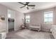 Light and airy Bedroom with a crib, area rug, accent wall, and an adjacent closet at 5460 S Dillon Cir, Mesa, AZ 85212