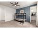 A bedroom with a bunkbed frame, carpeted floors and a blue accent wall at 5460 S Dillon Cir, Mesa, AZ 85212