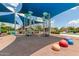 A well-equipped community playground with climbing structures, and colorful play mounds at 5460 S Dillon Cir, Mesa, AZ 85212