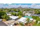Overhead shot of a neighborhood featuring mature trees, desert landscaping, and a mountain backdrop at 5739 N 11Th St, Phoenix, AZ 85014