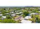 Aerial view of a house in a leafy neighborhood with desert landscaping at 5739 N 11Th St, Phoenix, AZ 85014