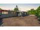 A spacious backyard with gravel landscaping and a modern single-story home at 5739 N 11Th St, Phoenix, AZ 85014