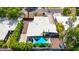 Aerial view of backyard featuring colorful sun shade, lush foliage, and privacy fence at 5739 N 11Th St, Phoenix, AZ 85014