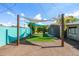 Backyard featuring turf area and overhead shade covering at 5739 N 11Th St, Phoenix, AZ 85014