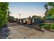 Backyard featuring gravel, artificial grass, and comfortable outdoor furniture at 5739 N 11Th St, Phoenix, AZ 85014