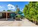 Private backyard retreat complete with turf area and cozy seating space at 5739 N 11Th St, Phoenix, AZ 85014