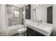 Updated bathroom with a tub and shower combination, and modern fixtures and finishes at 5739 N 11Th St, Phoenix, AZ 85014