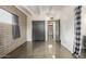 Bedroom area displays neutral walls and concrete floors with natural lighting at 5739 N 11Th St, Phoenix, AZ 85014