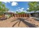 Mid-century home featuring desert landscaping, metal accents, and an attached garage at 5739 N 11Th St, Phoenix, AZ 85014