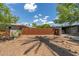 Mid-century home with gravel landscaping, unique metal decor, and an attached garage at 5739 N 11Th St, Phoenix, AZ 85014