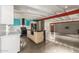 This kitchen features concrete floors, wooden island, and stainless steel appliances at 5739 N 11Th St, Phoenix, AZ 85014