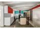 Bright kitchen with an island, contrasting cabinets, and stainless steel appliances at 5739 N 11Th St, Phoenix, AZ 85014