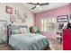 Cozy bedroom with plenty of natural light and a sitting area at 650 E Silver Creek Rd, Gilbert, AZ 85296