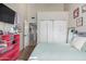 Bright bedroom with a large closet, a pink shelf, and decor art at 650 E Silver Creek Rd, Gilbert, AZ 85296