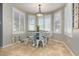 Charming dining area bathed in natural light with a modern table set at 650 E Silver Creek Rd, Gilbert, AZ 85296