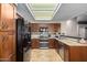 Charming kitchen features modern appliances, granite countertops, and recessed lighting at 650 E Silver Creek Rd, Gilbert, AZ 85296