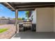 Outdoor grill with marble countertop and stainless steel appliances on the covered patio at 6751 W Cameron Dr, Peoria, AZ 85345