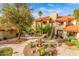 Beautiful exterior of the building with a decorative fountain and well-maintained landscaping at 7008 E Gold Dust Ave # 236, Scottsdale, AZ 85253