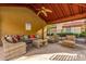 A comfortable lounge area, complete with cozy seating and a ceiling fan, provides a relaxing poolside experience at 7008 E Gold Dust Ave # 236, Scottsdale, AZ 85253