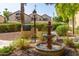 Relaxing water fountain and BBQ area add charm to this outdoor common area at 7008 E Gold Dust Ave # 236, Scottsdale, AZ 85253
