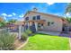 Beautifully landscaped backyard with pool, patio, lush greenery and a well-maintained lawn at 715 N Cholla St, Chandler, AZ 85224