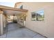 Covered backyard patio with easy access to backyard and home entrance at 715 N Cholla St, Chandler, AZ 85224