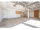 Spacious garage with built-in cabinets and ample storage space for vehicles and tools at 715 N Cholla St, Chandler, AZ 85224
