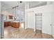 Open layout showing living area, kitchen with island, lots of natural light and closet at 715 N Cholla St, Chandler, AZ 85224