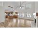 Open-concept living area with kitchen, fireplace, and views of the backyard at 715 N Cholla St, Chandler, AZ 85224