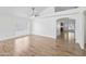Bright living room with hardwood floors, white walls, and ample natural light at 715 N Cholla St, Chandler, AZ 85224