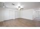 Spacious living room with ceiling fan, wood floors, and lots of light at 715 N Cholla St, Chandler, AZ 85224