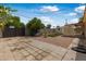 The home's backyard has an artificial turf lawn, a patio, and an uncovered parking space at 7250 E Mckellips Rd, Scottsdale, AZ 85257