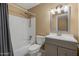 Bathroom with modern vanity, white toilet, and shower-tub combo, offering a clean design at 7250 E Mckellips Rd, Scottsdale, AZ 85257