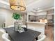 Open dining space with modern decor, seamlessly connecting to the kitchen for easy entertaining and Gathering meals at 7955 E Chaparral Rd # 115, Scottsdale, AZ 85250