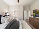 Comfortable main bedroom featuring modern furnishings and an ensuite bathroom at 7955 E Chaparral Rd # 115, Scottsdale, AZ 85250