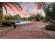 Backyard showcasing covered patio, outdoor dining area, and barbecue at 8035 E Paraiso Dr, Scottsdale, AZ 85255