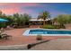 Lovely backyard pool and patio with grill is perfect for entertaining outdoors at 8035 E Paraiso Dr, Scottsdale, AZ 85255