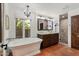 Bright bathroom with soaking tub, modern vanity, and walk-in shower at 8035 E Paraiso Dr, Scottsdale, AZ 85255