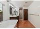 Bright bathroom features a soaking tub, walk-in shower, and wood accents at 8035 E Paraiso Dr, Scottsdale, AZ 85255