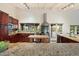 Spacious kitchen with stainless steel appliances, granite countertops, and an island at 8035 E Paraiso Dr, Scottsdale, AZ 85255