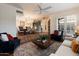 Open floor plan showcasing the living room and dining area with brick accents at 8035 E Paraiso Dr, Scottsdale, AZ 85255