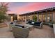 Spacious outdoor patio featuring ample seating, dining area, and lush landscaping at 8035 E Paraiso Dr, Scottsdale, AZ 85255