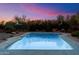 Beautiful pool with lush landscaping offers a private and serene outdoor space at 8035 E Paraiso Dr, Scottsdale, AZ 85255