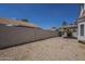 Large, low maintenance backyard with privacy fence at 823 W Bradford Dr, Gilbert, AZ 85233